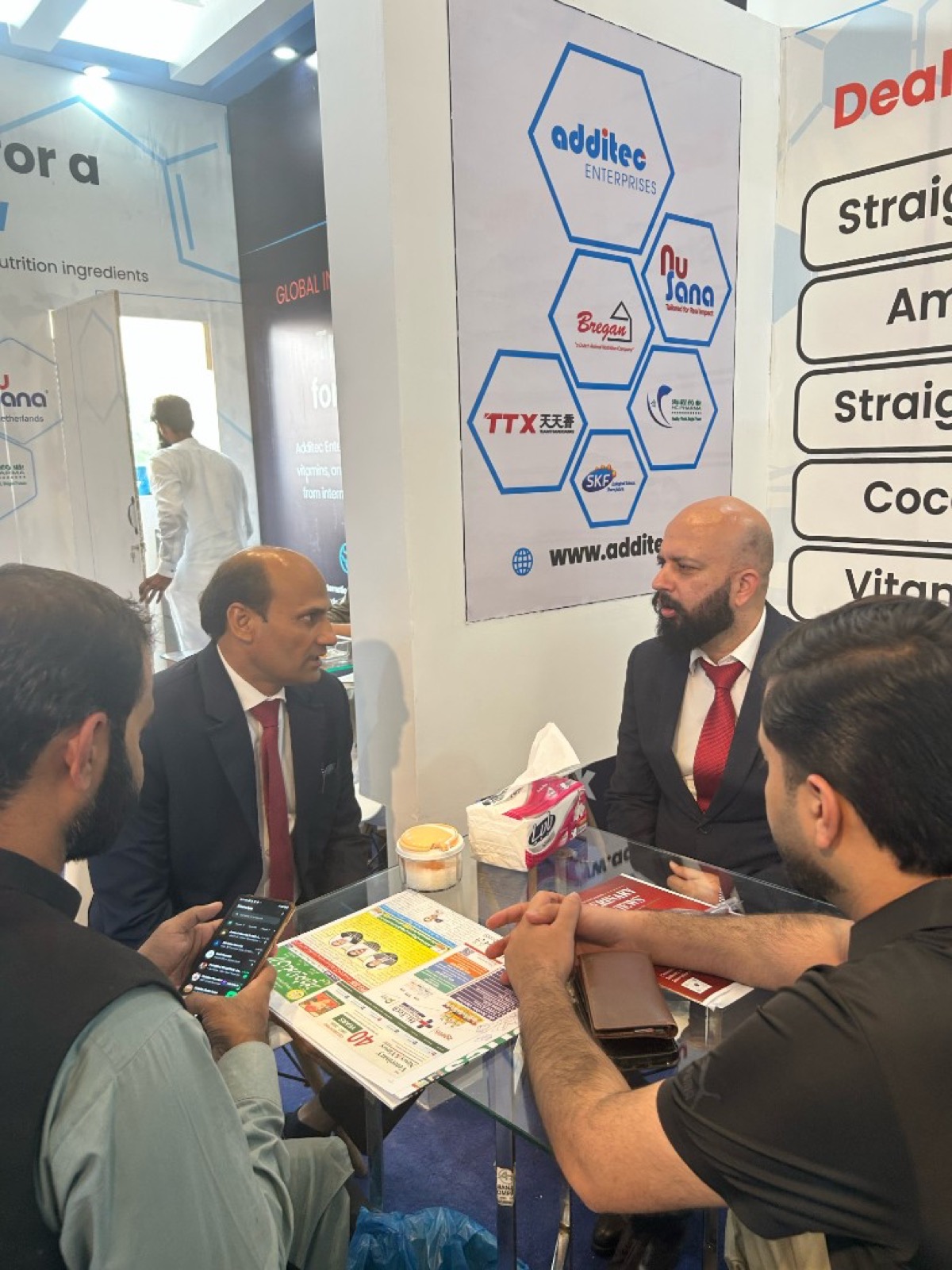 B2B discussion at Additec Enterprises booth during IPEX EXPO 2026