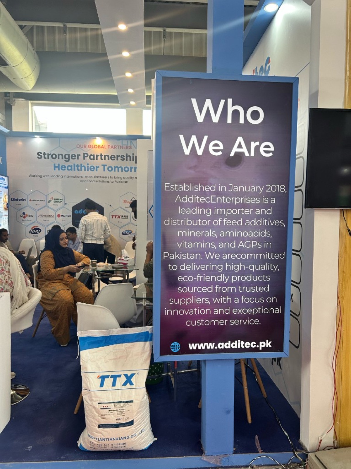 Additec Enterprises booth interior with Who We Are display at IPEX EXPO 2026