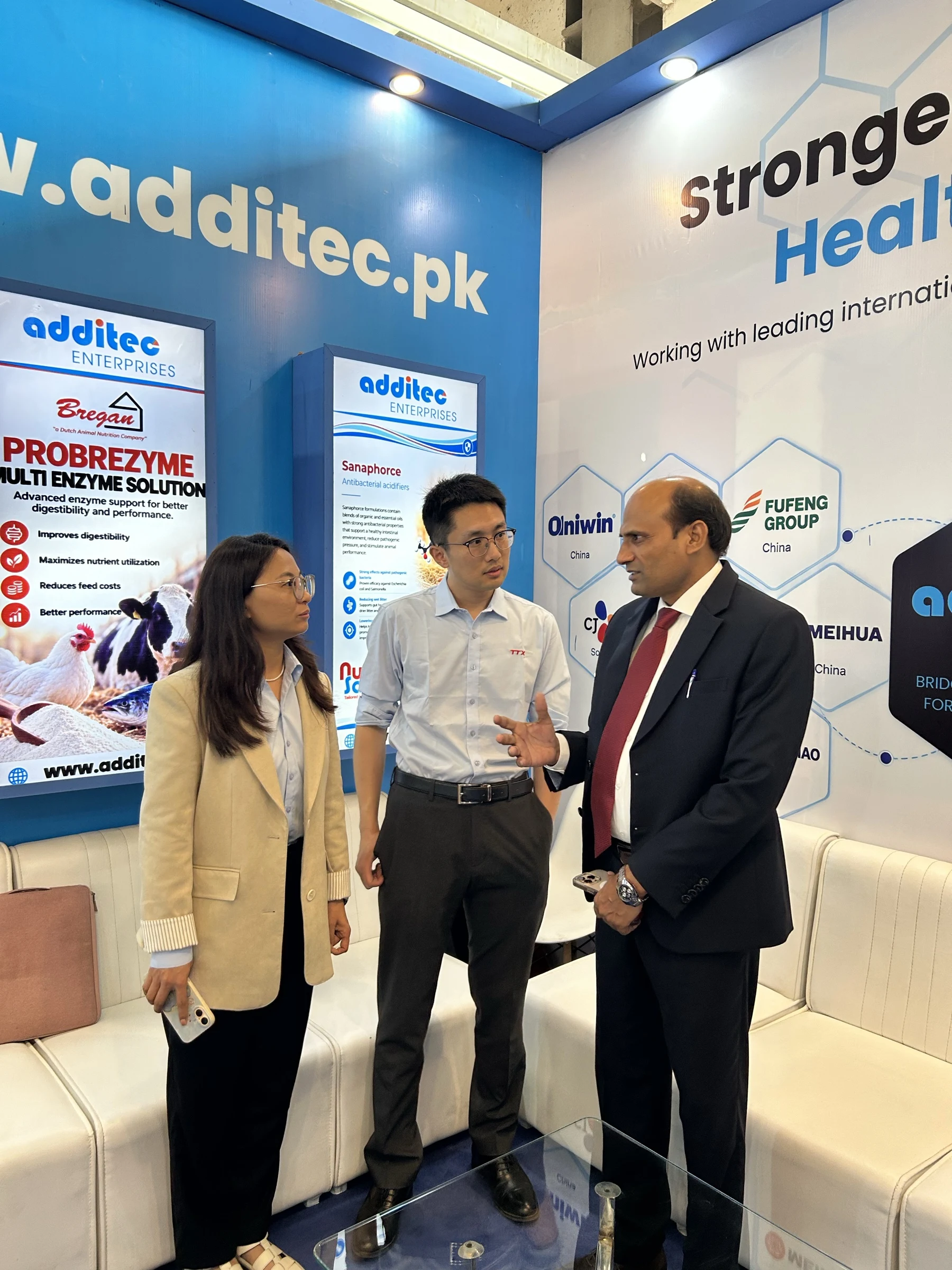 Standing product discussion at the Additec Enterprises IPEX EXPO 2026 booth