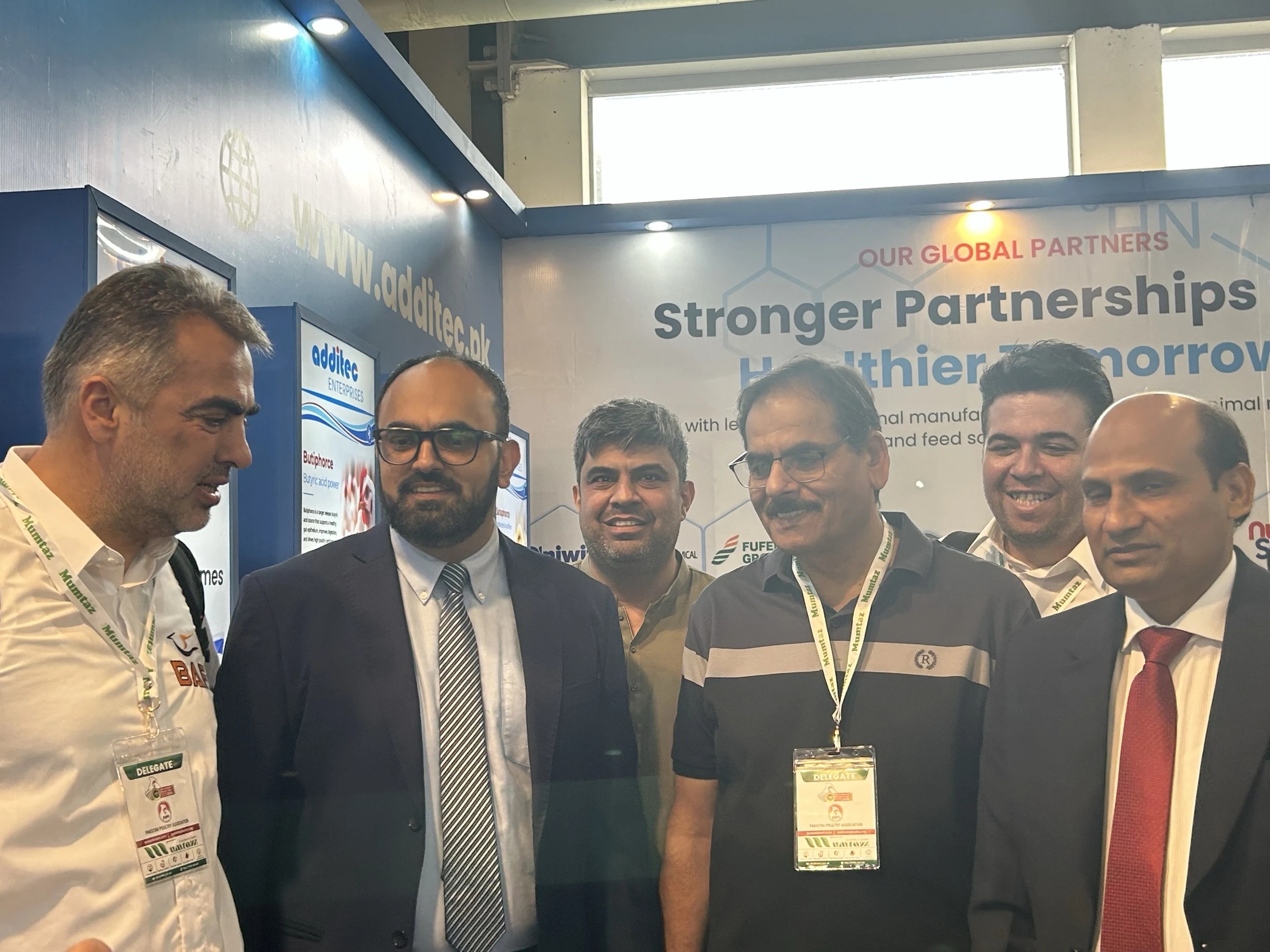 Group photograph at the Additec booth with Dr Ilyas, Randhawa and BAF Company during IPEX EXPO 2026 Day 01