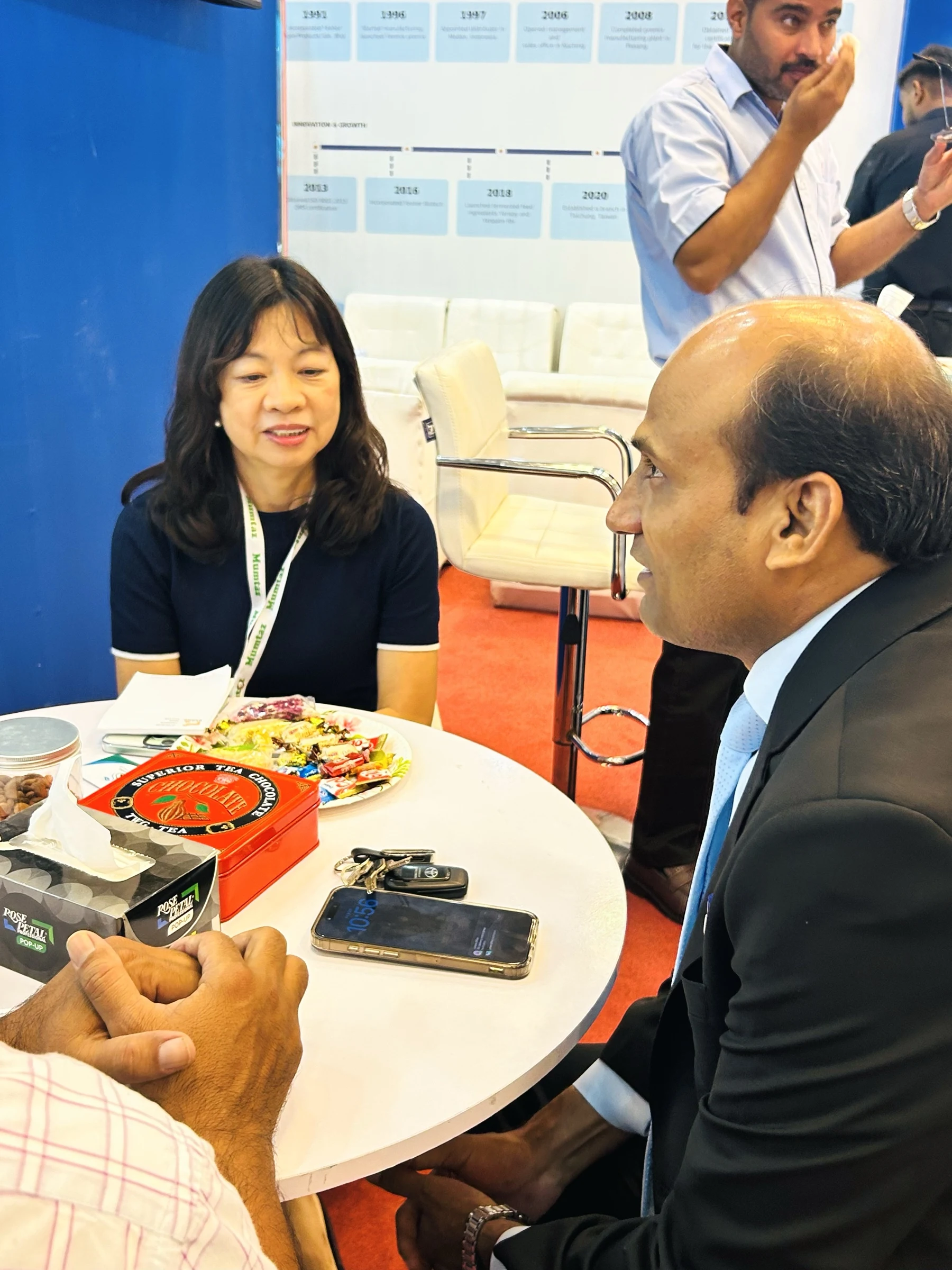 Three-person booth meeting associated with Yen Har Malaysia at IPEX EXPO 2026