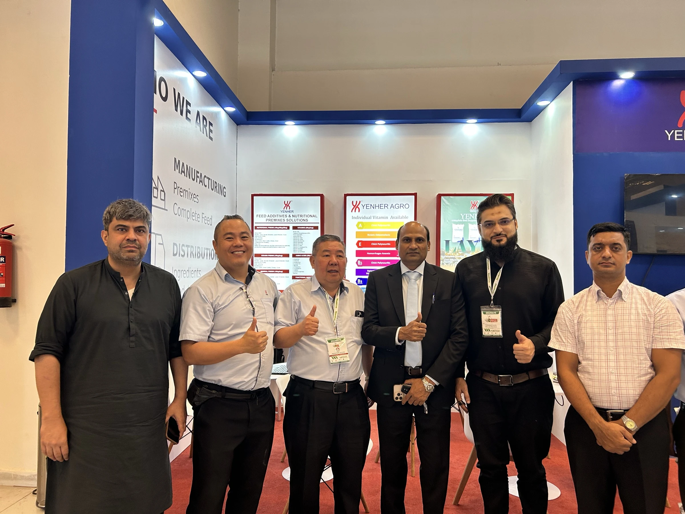 Group photograph with Yen Har Malaysia representatives at a Yenher Agro exhibition booth during IPEX EXPO 2026 Day 02