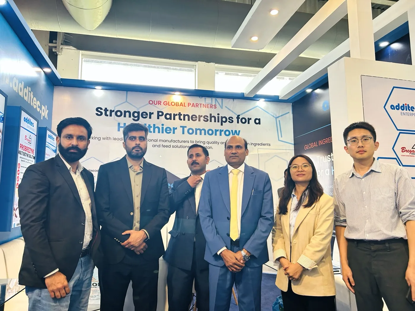 Visitors standing with Additec Enterprises representatives at IPEX EXPO 2026